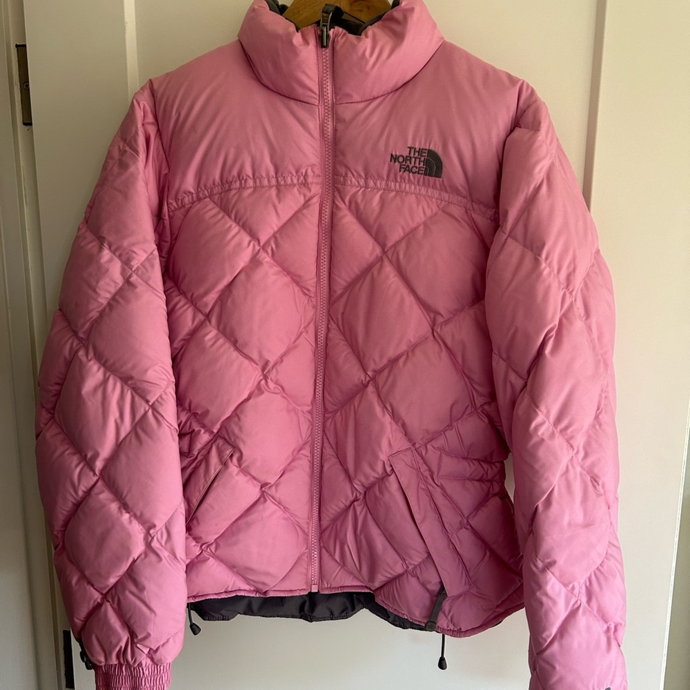 North Face pink puffer jacket.